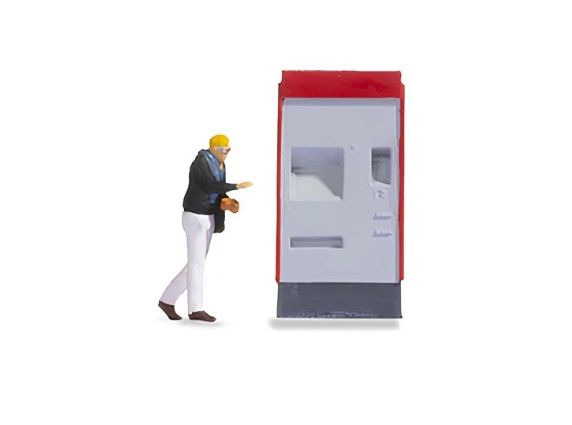 NOC16529 - Piccole scene - Figura con dispenser sulla banchina della stazione - 1