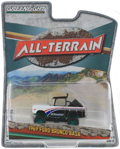 GREEN35230-AVERT - 1969 FORD Bronco Baja BFGoodrich con ruote verdi della serie ALL-TERRAIN in blister - 1