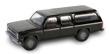 GREEN28150-D - CHEVROLET Suburban C10 custom deluxe 1985 nero della serie BLACK BANDIT in blister